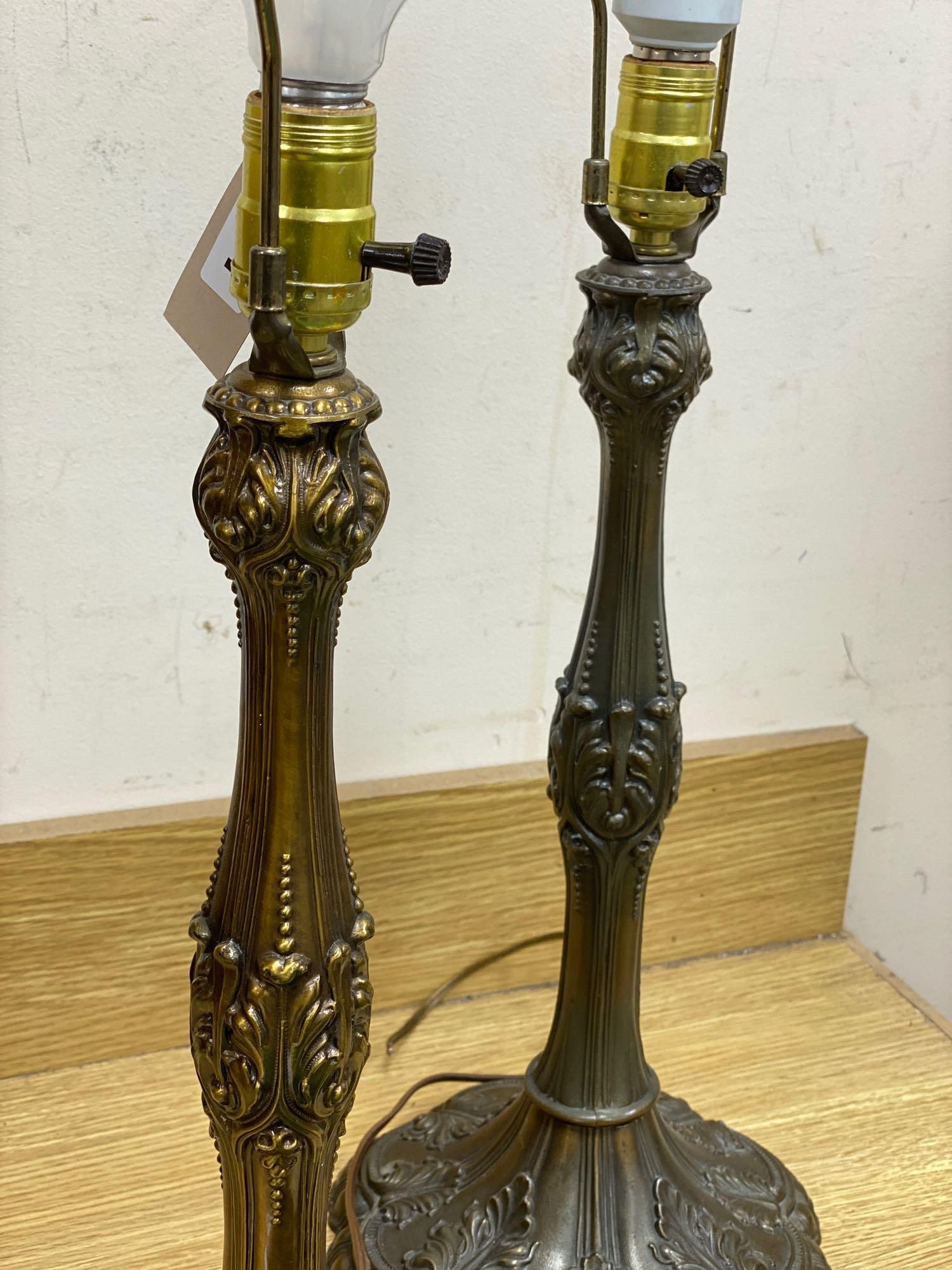 A pair of brass Art Nouveau style lamps